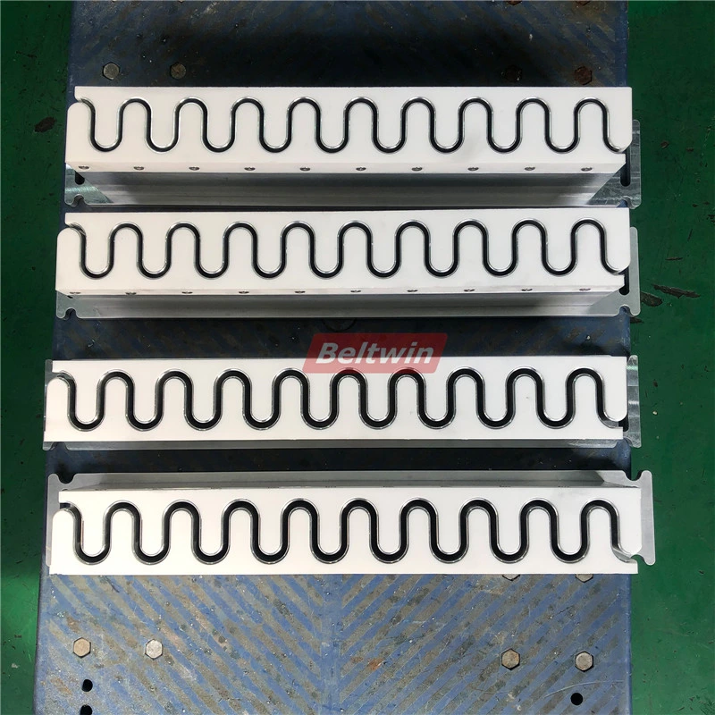 Formen von Förderbandstollenführung, Seitenwand und Profilen für das Hochfrequenz-Bandschweißen